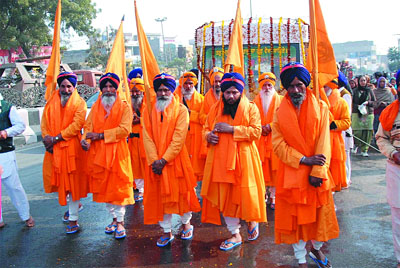 Panj Piyaras lead the Nagar Kirtan on the occasion of the birth anniversary of Guru Gobind Singh Ji in Bathinda on Friday.