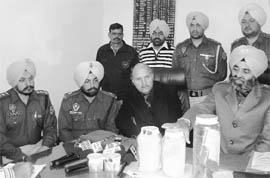 Deputy Commissioner Yashveer Mahajan and SSP RS Khatra at a press conference in Fatehgarh Sahib on Friday. 