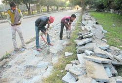 Paver blocks laid a year ago are being replaced with new ones in Sector 29, Chandigarh.