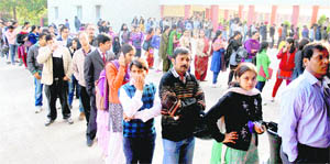 Admission form seekers queue up at Sacred Heart School in Sector 26. 
