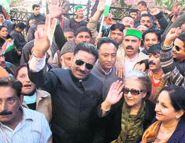 Congress workers, led by CLP leader Vidya Stokes, hold a protest outside the DCs office in Shimla on Friday. 