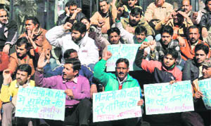 Activists of the Shimla Nagrik Sabha hold a protest in Shimla on Friday. 