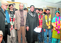 Kashmir province president of the NC Ali Mohammad Dar and other party leaders welcome panches and sarpanches from the Ganderbal and Sangrama-Baramulla areas, who joined the party during a function at the NC headquarters on Friday