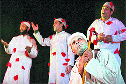 Artistes perform a play during the Budshah Theatre Festival at Abhinav Theatre in Jammu on Friday