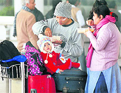 A large number of people remained stranded at the Delhi airport due to the cancellation of their flights on Friday