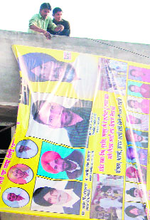 Hoardings being removed on ECs order in Faridkot.
