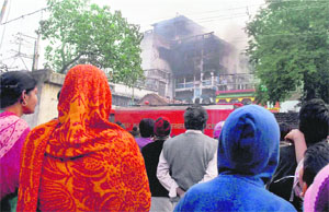 Why not be safe rather than being sorry? Lack of adherence to safety norms results in loss of life and property. People gather near a rubber factory at Topsia in Kolkata where a fire had broken out