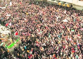 Demonstrators protest in Homs, the flashpoint central Syrian city