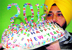 Harwinder Singh Gill has created a New Year wish made of flags of 250 nations