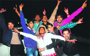 Partying into 2012: Revellers welcome New Year in Chandigarh on Saturday.