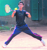 Rohit returns a shot during a tennis match at YMCA, Sector 11, Chandigarh, on Sunday. 