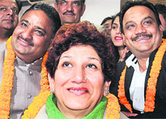 Raj Bala Malik, the newly elected Mayor of Chandigarh, flanked by Darshan Garg, Senior Deputy Mayor (left), and Satish Kainth, Deputy Mayor (right), in her office at Sector 17, Chandigarh, on Sunday.