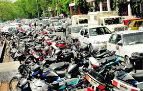 Due to acute shortage of space, mismanagement in a parking lot in Sector 17, Chandigarh.