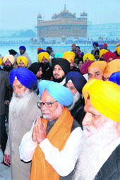 PM Manmohan Singh at the Golden Temple in Amritsar on Sunday.