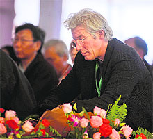 Hollywood actor Richard Gere listens to the teachings of Tibetan spiritual leader The Dalai Lama at the ritual and teaching session in Bodhgaya on Sunday, the first day of the Kalachakra Festival. Kalachakra 2012, a festival of teachings and meditations will take place from January 1 for 10 days in Bihar