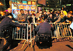 Occupy Wall Street protesters and the police clash at Zuccotti Park in New York. The demonstrators returned to the park after being evicted by the police in November
