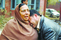 Wailing family members of deceased Suresh Kumar in Jalandhar on Monday.