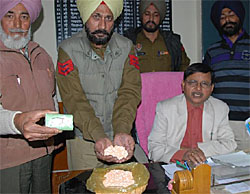 Officials of the Central Jail in Bathinda showing the tablets used as sedatives recovered from an inmate