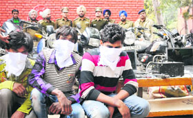 The accused in police custody at the Sector 11 police station in Chandigarh on Monday. 