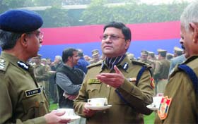 Police commissioner BK Gupta and another officer at a tea party held at the PHQ on Monday