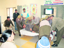 Police personnel learn first-aid techniques at a camp organised at Hisar.