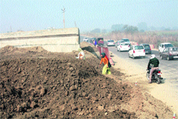 Work in progress on an underpass near Kharawar village on NH 10. 