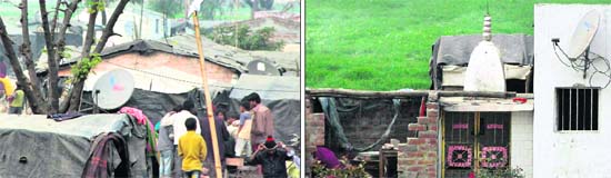 Dish antennae installed on huts in a basti near the Chtti Bein on Nakodar Road in Jalandhar