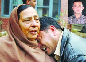 Family members of Suresh Kumar (inset) become inconsolable after learning about his murder in Jalandhar on Monday