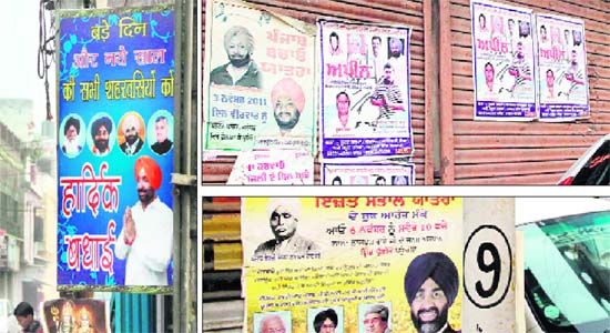 Hoardings and posters of major political parties dot the city in violation of the model code of conduct
