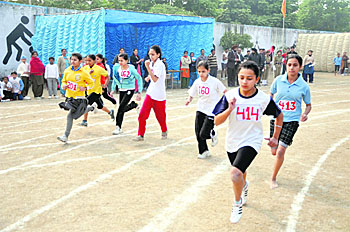 Girls take part in a race on the opening day of BVM School's Inter-Branch Athletics Meet on Monday.
