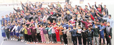 Sportspersons, coaches and promoters take an oath at Guru Nanak Stadium in Ludhiana on Monday.