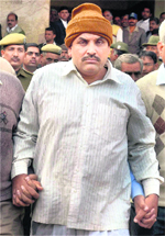 Sahiram Bishnoi, the key conspirator in the Bhanwari Devi case, being produced in a CBI court in Jodhpur on Monday. 