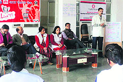 Officials of the Health Department brief staff members on the 108 Emergency Ambulance Services