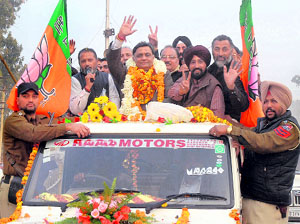 BJP leader Manoranjan Kalia arrives in Jalandhar after getting a ticket on Tuesday. 