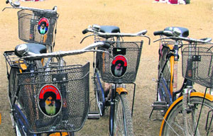 A view of cycles with the photograph of Chief Minister Parkash Singh Badal at Shaheed Sukhdev Thapar Government School in Ludhiana.