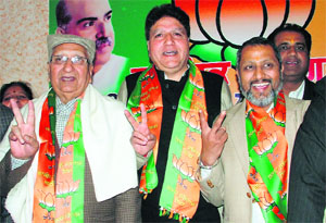 From left to right: Satpal Gosain, Rajinder Bhandari and Parveen Bansal, BJP candidates from Ludhiana central, west and north, respectively at a workers meeting in Ludhiana. 