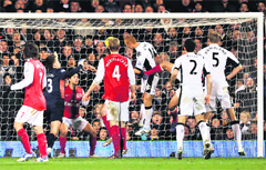 Fulhams Bobby Zamora scores the winner against Arsenal in London on Monday. 