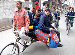 Over-loaded rickshaws not only endanger the lives of its occupants but also pose traffic hazard to the motorists plying on the road