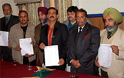 City hoteliers showing their pending bills in Bathinda on Wednesday