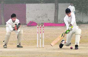 Players in action during the Saupin's Tricity League Cricket Tournament at Sector 48, Chandigarh