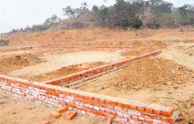 Plots being carved by levelling a hillock near Karoran village