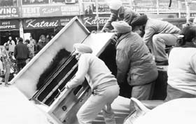 MC employees remove encroachments from outside a shop in Phase IIIB-II in Mohali on Wednesday