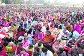 Women Congress supporters wait for Congress president Sonia Gandhi at Haldwani on Wednesday