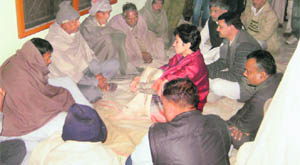 Union minister Kumari Selja with family members of deceased schoolchildren at Sabga village in Ambala district on Wednesday. 