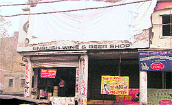 Display boards outside liquor vends covered with cloth following notices issued by the Excise and Taxation Department