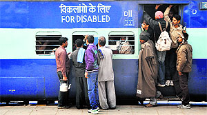 Passengers swarm the bogey of Malwa Express meant for disabled passengers in Ludhiana