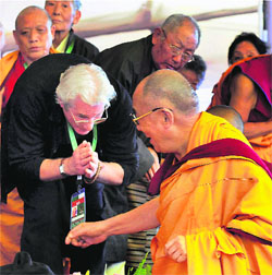 Hollywood actor Richard Gere greets the Dalai Lama on Day 4 of the Kalchakra festival in Bodh Gaya on Wednesday. The Tibetan spiritual leader was also conferred the Mahatma Gandhi International Award for Peace and Reconciliation.