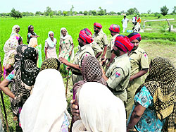 Farmer clashes over land acquisition for the plant in Mansa have held up the project