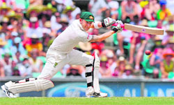 Michael Clarke drives the ball on day two of the second Test against India at the Sydney Cricket Ground on Wednesday.
