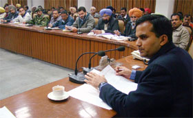 Deputy Commissioner Kamal Kishore Yadav addresses the officials at a meeting in Bathinda on Thursday.